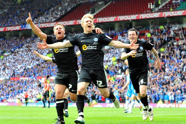 Craig Mackail-Smith celebrates his goal against Huddersfield.