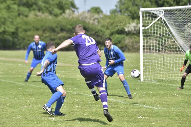 Action from Farcet's 4-2 Junior Cup win at Stanground Sports (purple). Photo: David Lowndes.