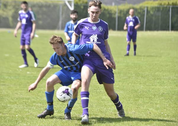 Action from Stanground Sports (purple) v Farcet United. Photo: David Lowndes.