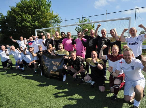 Marco Sementa with his teams celebrating his 150th charity football match.