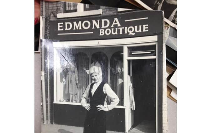 Edmonda outside her boutique store.