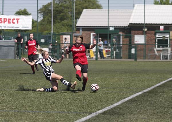 Katie Steward makes a tackle for Peterborough Northern Star Ladies Reserves against Netherton in a Cambs Womens Premiership match. Photo: Tim Symonds.