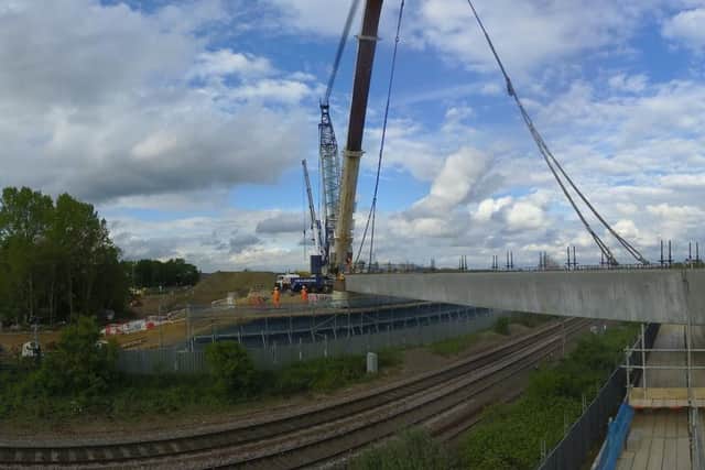 The beams are lifted into place