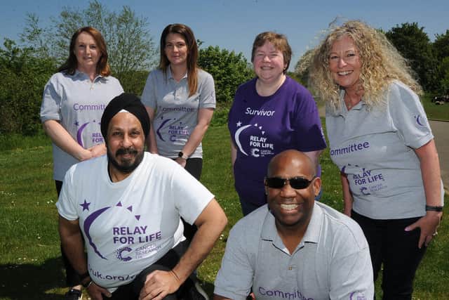 Organisers of the Peterborough Relay for Life with Deljit Singh -   Sharon Clapham, Sarah Sindall, Lisa McLoughlin, Tracey Yearwood and Jason Yearwood. pictured at the race venue at Ferry Meadows. EMN-210529-155120009