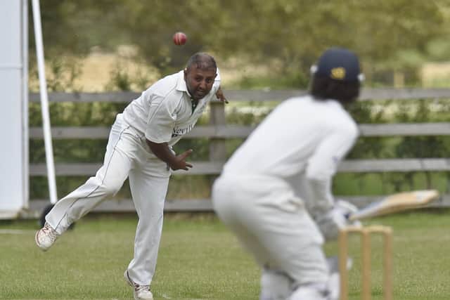 Wahid Javid bowling for Ufford Park against Old Leysians. Photo: David Lowndes.