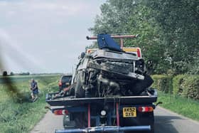 Wreckage of the silver Toyota involved in the crash.