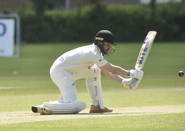 Chris Milner of Peterborough Town on his way to a first Northants Premier Division ton against Horton House last weekend. Photo: David Lowndes.