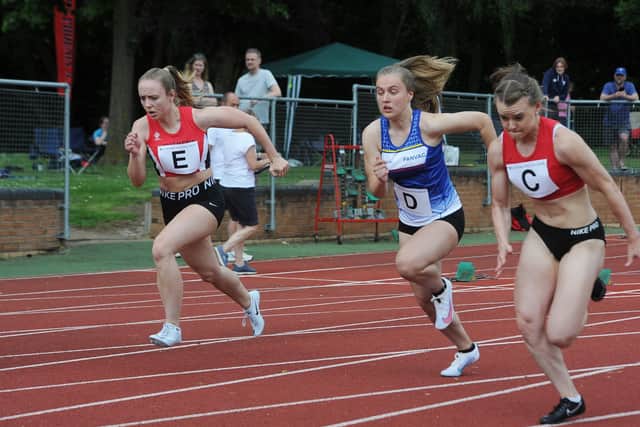 Kiera Gilman (centre) in a senior 100m sprint at the National League meeting on the Embankment. Photo: David Lowndes.