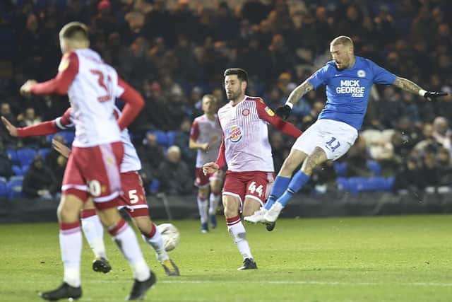 Marcus Maddison in action for Posh.