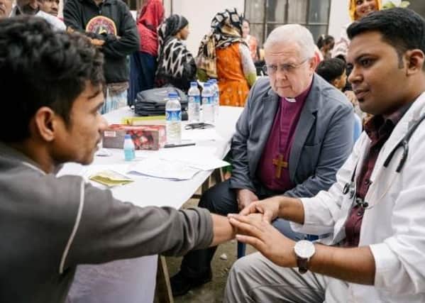 The Bishop of Peterborough at a 'pop-up' skin clinic in search of new leprosy cases in Dhaka, Bangladesh