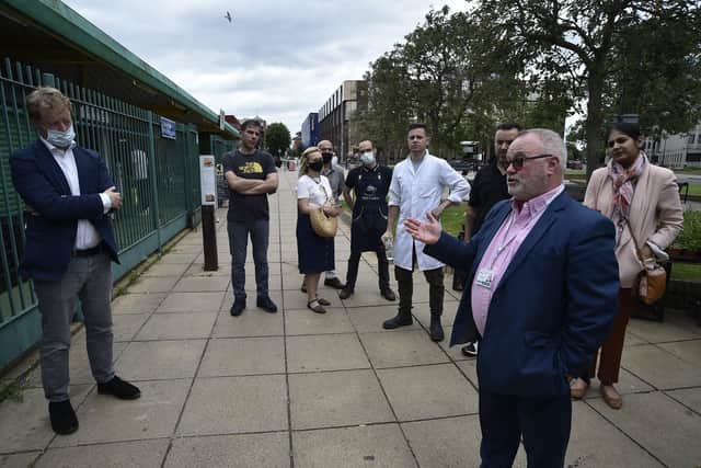 The meeting between the politicians and market traders