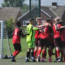 Netherton celebrate their second goal in the JPL National Under 18 semi-final at the Grange. Photo: David Lowndes.
