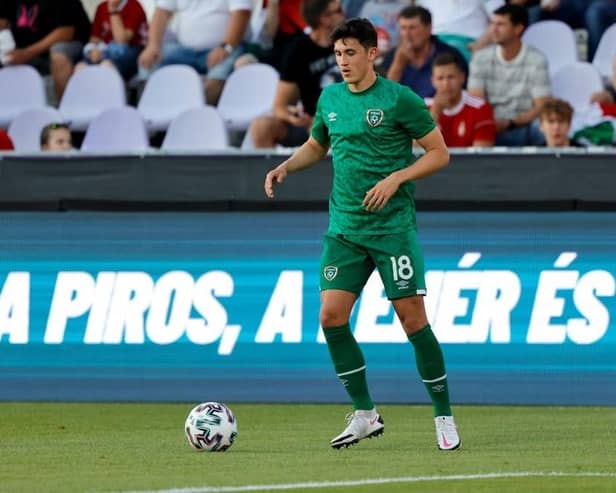 Jamie McGrath warms up for Republic of Ireland prior to the friendly against Hungary. (Photo by Laszlo Szirtesi/Getty Images)