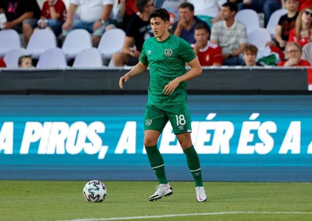 Jamie McGrath warms up for Republic of Ireland prior to the friendly against Hungary. (Photo by Laszlo Szirtesi/Getty Images)