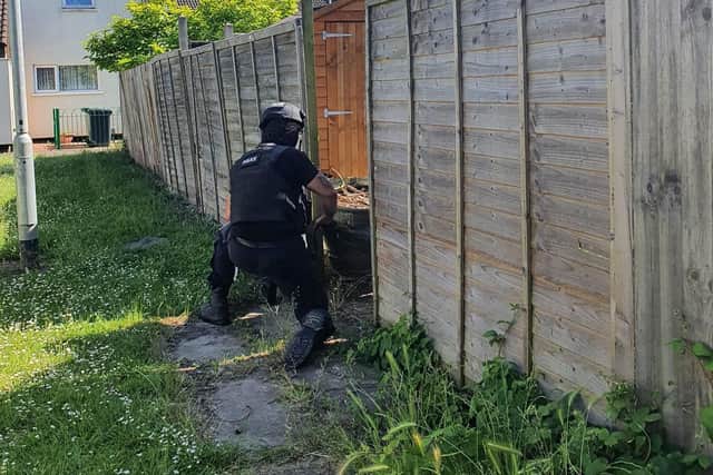 An armed officer in Paston.