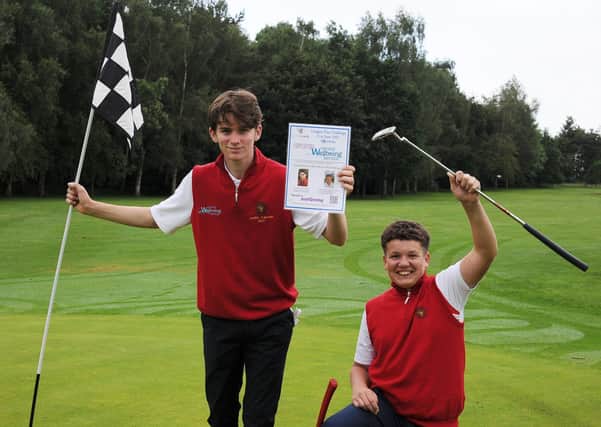 Leo Brown (left) and Sam Marshall (right) from Elton Furze Golf Club during their Longest Day Challenge of 101 holes.