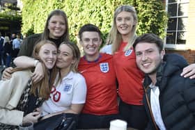 England fans watching the Czech Republic game at The Deeping Stage, Market Deeping. EMN-210622-212524009