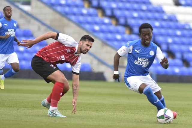 Siriki Dembele beats his man in the Carabao Cup First Round last season.