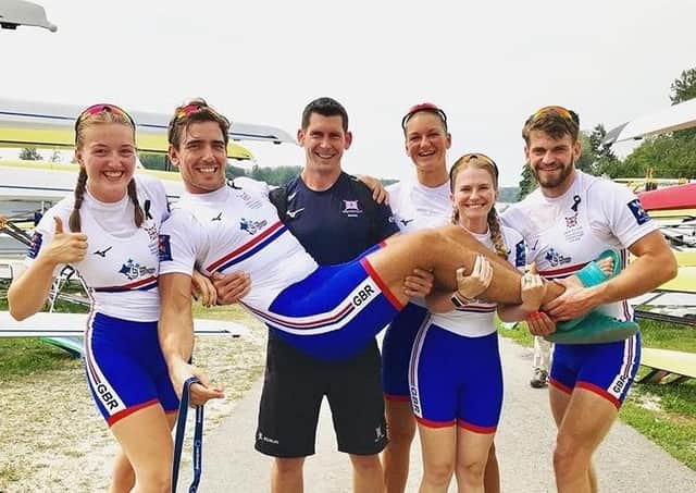James Fox is lifted by a World Cup winning GB squad.