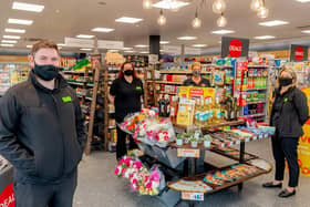 Store Manager Jordan Rolf (left) and colleagues in the Hempsted Central England Co-op following its makeover.