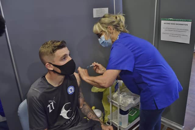 Posh players were among those to be vaccinated at the London Road stadium two months ago