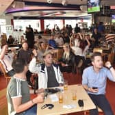 England fans at the Coyotes Bar, New Road, Peterborough EMN-210629-193410009