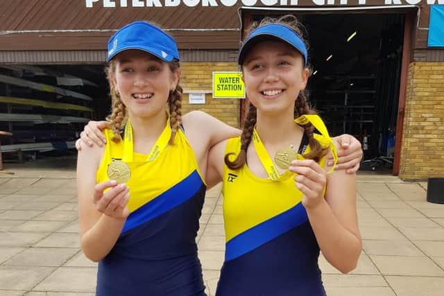 Emily Fitzjohn and Emma Calver with their gold medals.