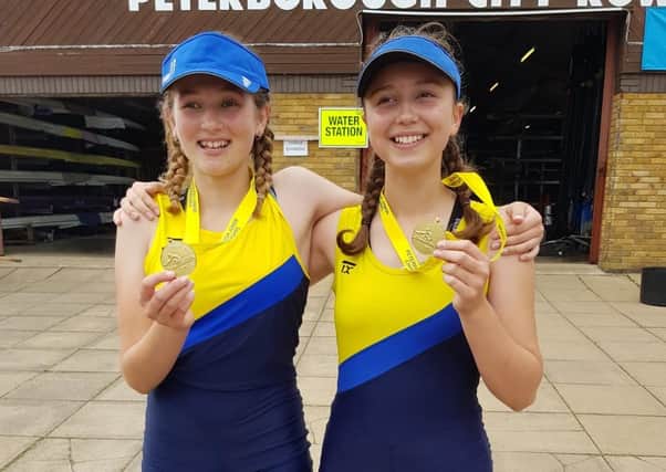 Emily Fitzjohn and Emma Calver with their gold medals.