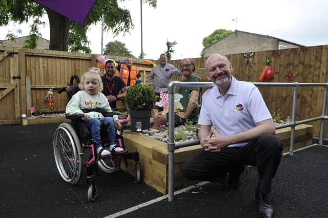 Sienna with Ed Bailey and Luke Payn from Cross Keys Homes, Gary Gibbs and Paul Duell from Mears and Jon Scunthorpe from Pro Edge Construction