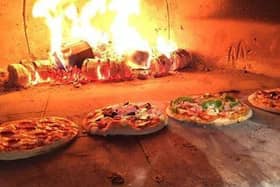 How do you like your pizza - wood fired like at Pizza Parlour and Music Cafe? QqJ-_FqaYZ-zh1a_aD4M