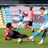 Luke O'Nien blocks a Jonson Clarke-Harris shot when playing for Sunderland against Posh last season. Photo: Joe Dent/theposh.com.