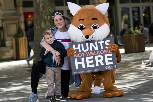 Harry and Lisa Smith with the League's 'fox'