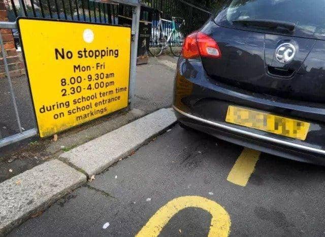 Illegal parking outside a school in Peterborough