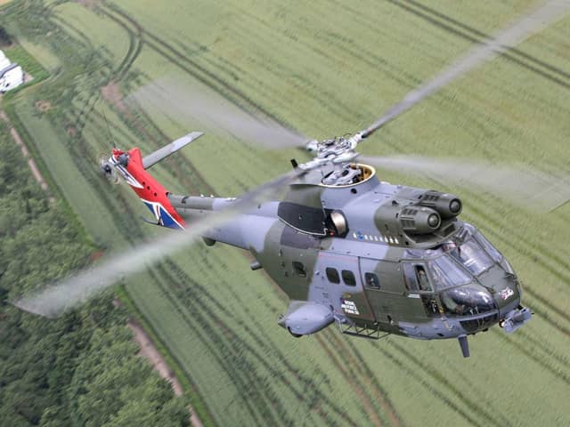 A 50th Anniversary Puma helicopter flies over the Oxfordshire countryside on 2nd July 2021.
As part of the Puma 50th anniversary celebrations and commemorations, Puma HC Mk 2 XW224 has been re-painted in a unique paint scheme.  The aircraft scheme is similar to that which the first aircraft were painted when they were delivered in 1971 but with several notable differences. The engine housing boasts the badges of all squadrons who have flown the Puma, both as a HC Mk 1 and a HC Mk 2.  The tail fin is also emblazoned with the union flag.  On the cabin door, the standard Royal Air Force logo has been replaced with the bespoke Puma 50 logo and the cockpit door is annotated with the name of the first Squadron Commander who brought the aircraft into operational service.