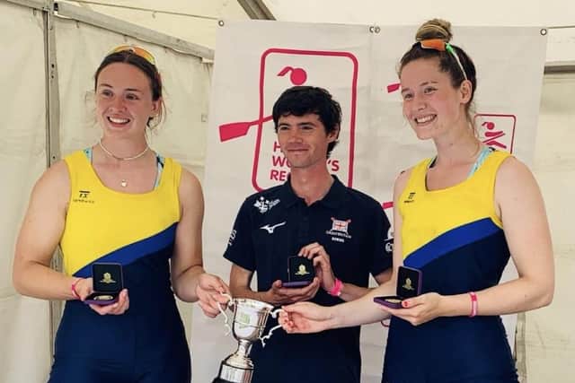 Henley Regatta winners Harriet Drake-Lee (left) and Charlotte Bolton (right) with coach Oliver James.