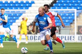 Ryan Broom in action for Posh.
