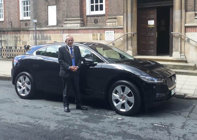 Mayor of Peterborough Cllr Steve Lane with the new electric jaguar
