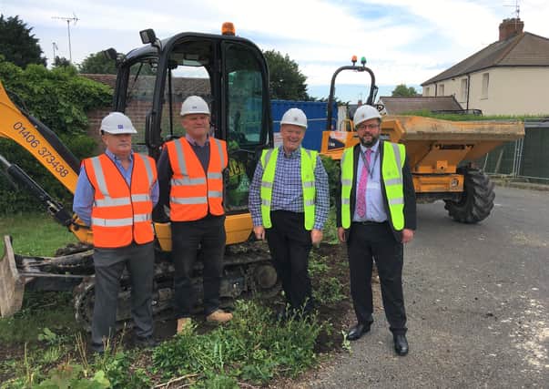 Senior Quantity Surveyor Sean Buxton and Contracts Manager Tony Hughes, both of D Brown Building Contractors, with SKDC Cabinet Member for Housing and Property, Coun Robert Reid, and SKDC Director for Housing and Property, Andrew Cotton. EMN-210807-151002001