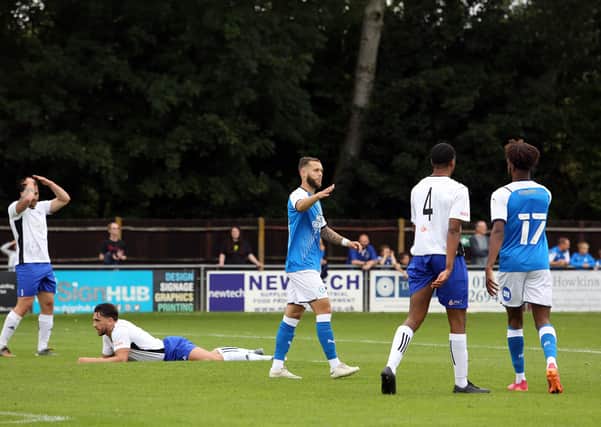 New Posh signing Jorge Grant celebrates scoring the opening goal of the game against Bedford Town. Photo: Joe Dent/theposh.com.