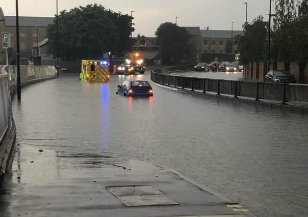 Flooding in Bourges Boulevard that left an ambulance needing to be rescued.