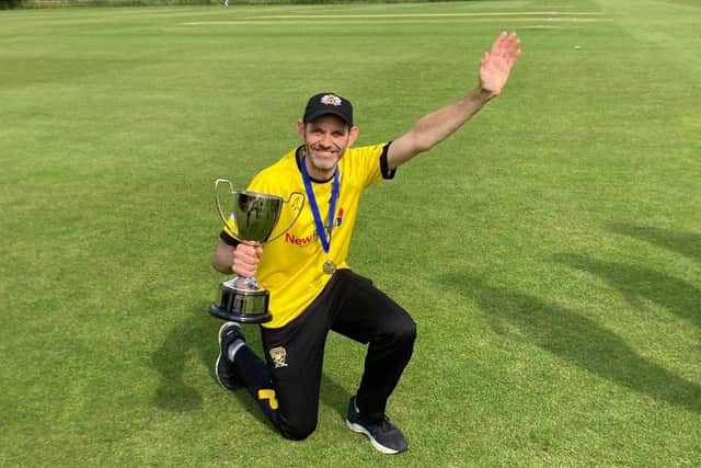Peterborough Town bowler Richard Kendall with the Northants Championship T20 Trophy.