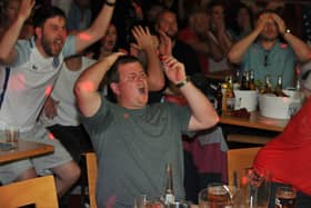 Emotions etched on the faces of fans watching England's Euros final defeat to Italy at Coyote's in Peterborough. Pictures: Chris Lowndes