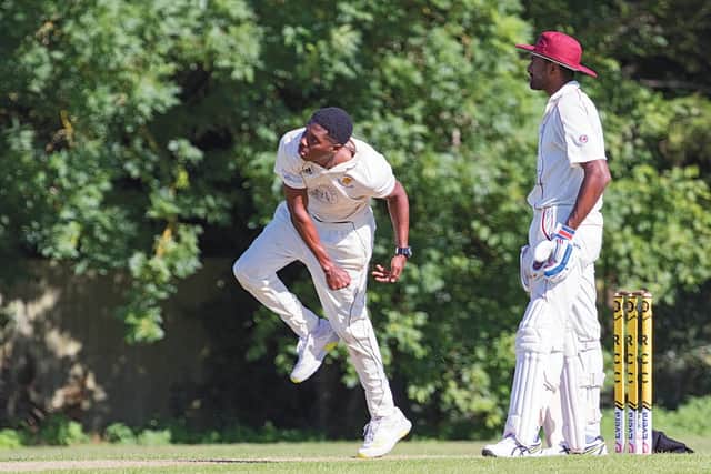 Keddy Lesporis bowling for Ramsey against March. Photo: Pat Ringham.