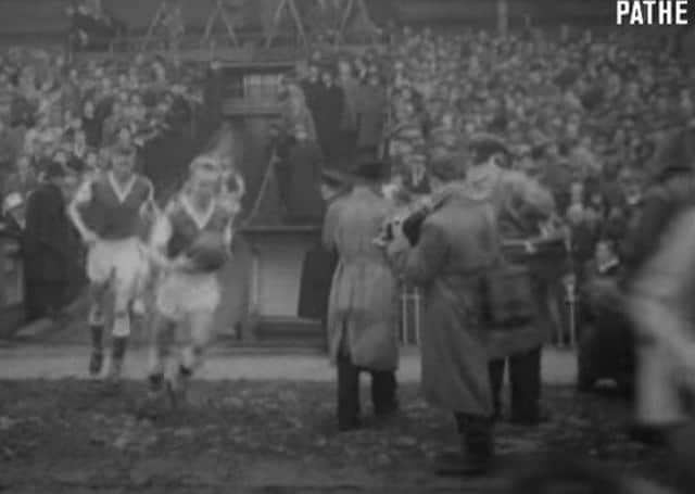 Pathe archive footage of Sheffield Wednesday versus Peterborough United in the FA Cup in 1960.