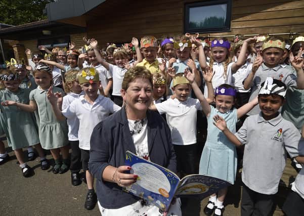 William Law C of E primary school head teacher Tracey Cunningham with  year 1  children at her retiring event at school. EMN-210722-093054009