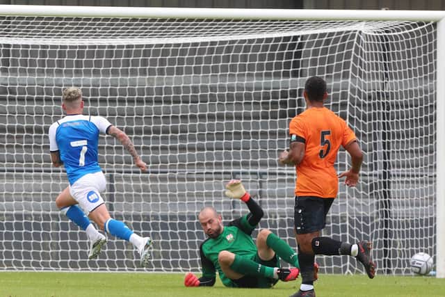 Sammie Szmodics scores for Posh at Barnet. Photo: Joe Dent/theposh.com.