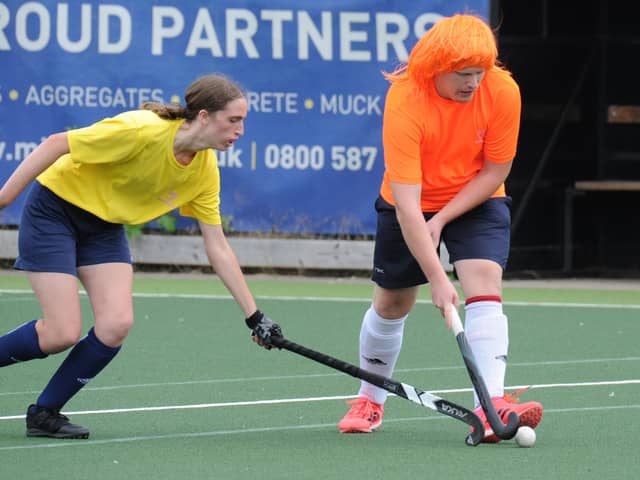 Action from the SWAN Charity Hockey tournament. Photo: Chris Lowndes.