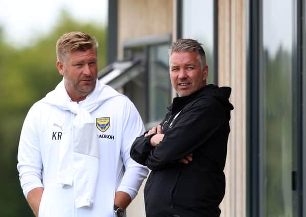Posh boss Darren Ferguson (right) with Oxford United manager Karl Robinson ahead of last week's friendly.