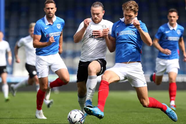 Posh striker Jack Marriott battles for possession at Portsmouth.  Photo: Joe Dent/theposh.com.