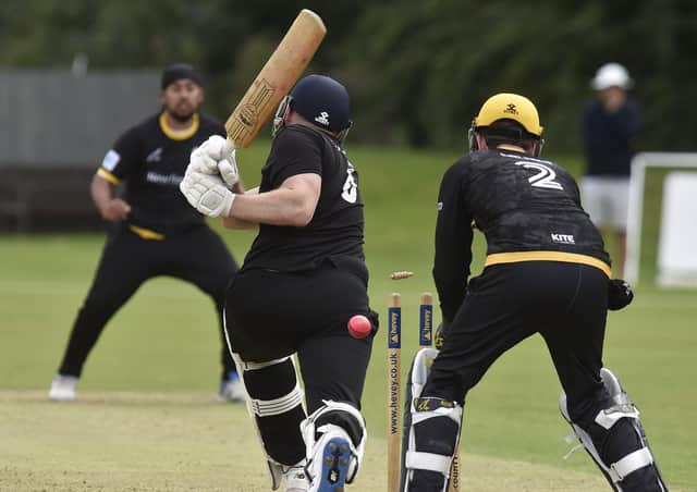 A wicket for Peterborough Town's Karanpal Singh against Overstone. Photo: David Lowndes.